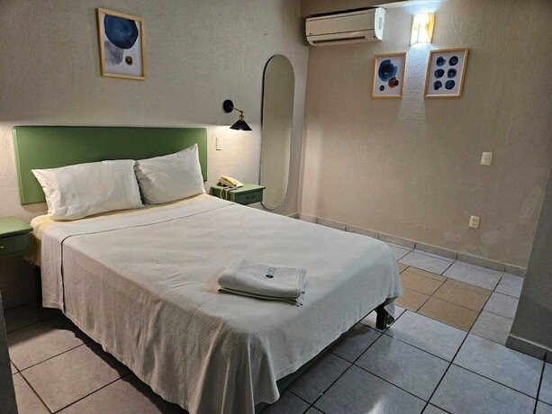 Imagen de la habitación del Hotel Punto Poza Rica. Foto 18