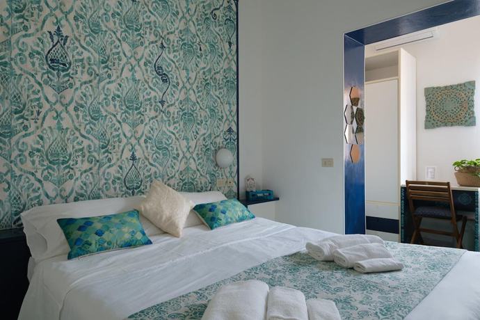 Imagen de la habitación del Hotel Punto Verde. Foto 9