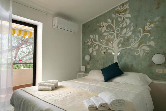 Imagen de la habitación del Hotel Punto Verde. Foto 10
