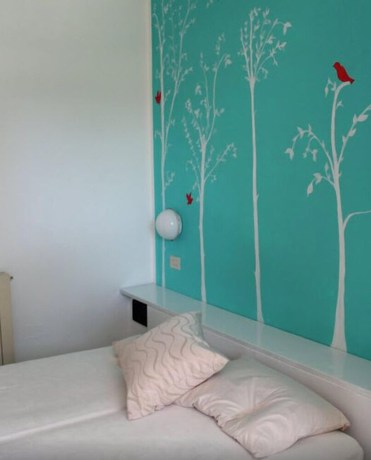 Imagen de la habitación del Hotel Punto Verde. Foto 16