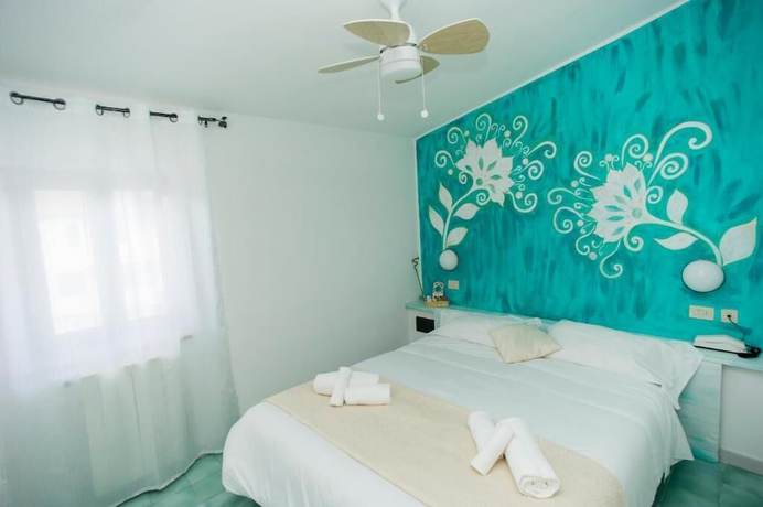 Imagen de la habitación del Hotel Punto Verde. Foto 18