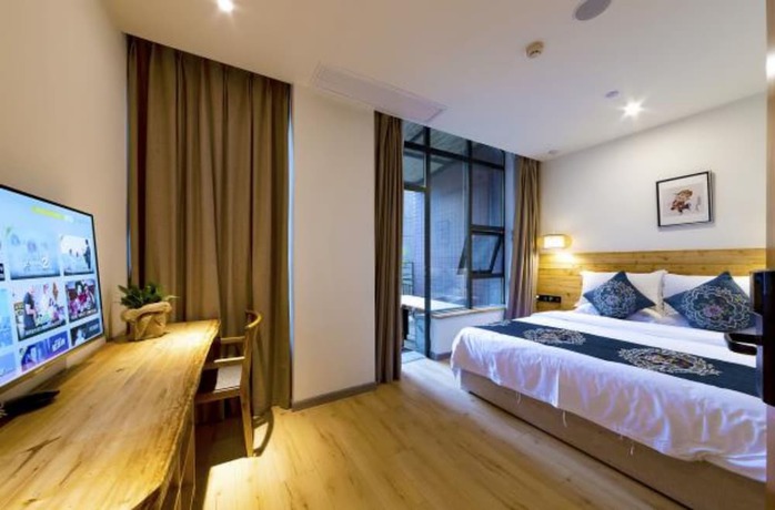 Imagen de la habitación del Hotel Puqi Nanting Garden. Foto 9