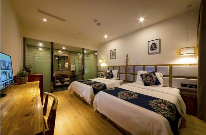 Imagen de la habitación del Hotel Puqi Nanting Garden. Foto 10