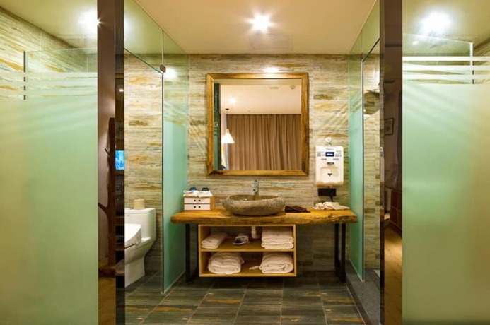 Imagen de la habitación del Hotel Puqi Nanting Garden. Foto 12