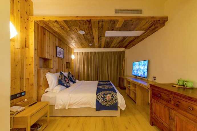 Imagen de la habitación del Hotel Puqi Nanting Garden. Foto 13