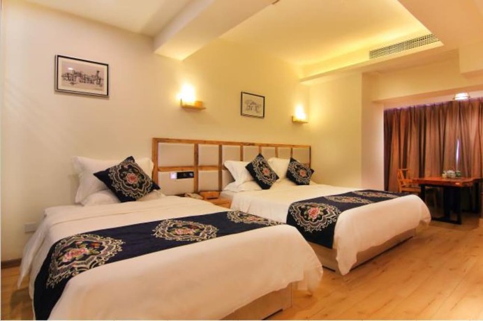 Imagen de la habitación del Hotel Puqi Nanting Garden. Foto 16