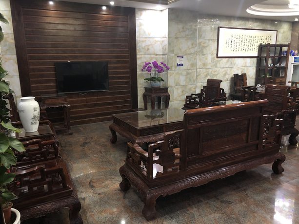 Imagen de los interiores del Hotel Puqian Business. Foto 11