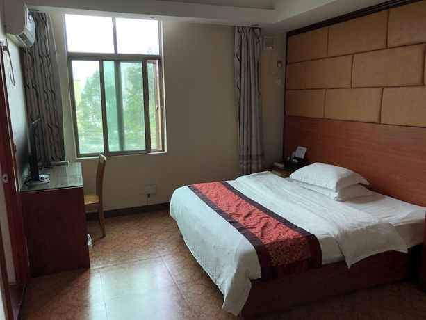 Imagen de la habitación del Hotel Puqian Business. Foto 3