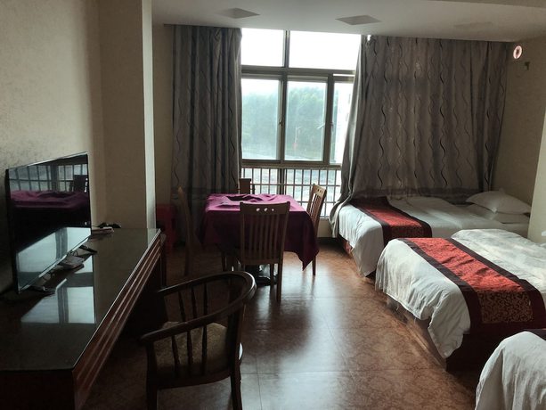 Imagen de la habitación del Hotel Puqian Business. Foto 4