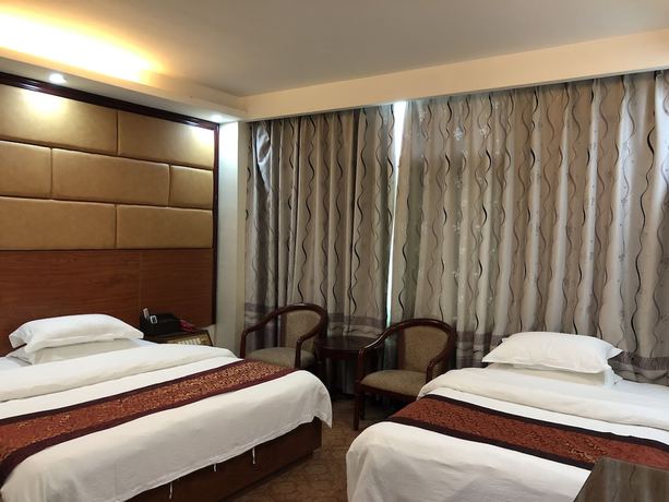 Imagen de la habitación del Hotel Puqian Business. Foto 5