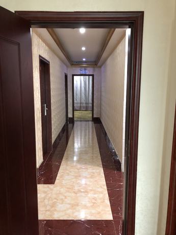 Imagen de los interiores del Hotel Puqian Business. Foto 15