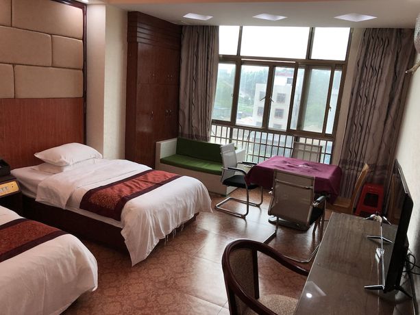 Imagen de la habitación del Hotel Puqian Business. Foto 9