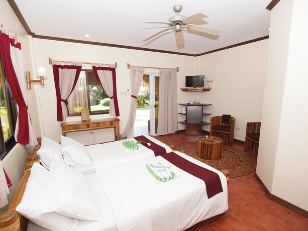 Imagen de la habitación del Hotel Pura Vida Beach and Dive Resort. Foto 15