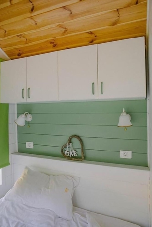 Imagen de la habitación del Hotel Pura Vida Downtown Tiny Houses. Foto 5