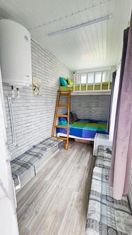 Imagen de la habitación del Hotel Pura Vida Downtown Tiny Houses. Foto 8