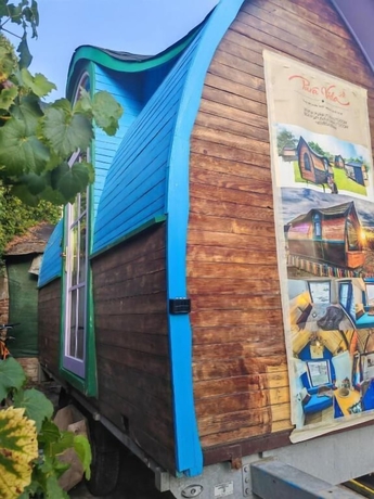 Imagen de la habitación del Hotel Pura Vida Downtown Tiny Houses. Foto 9