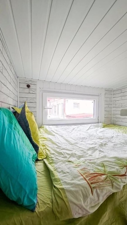 Imagen de la habitación del Hotel Pura Vida Downtown Tiny Houses. Foto 12