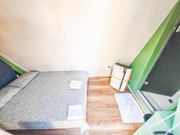 Imagen de la habitación del Hotel Pura Vida Downtown Tiny Houses. Foto 14