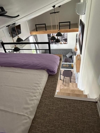 Imagen de la habitación del Hotel Pura Vida Downtown Tiny Houses. Foto 15