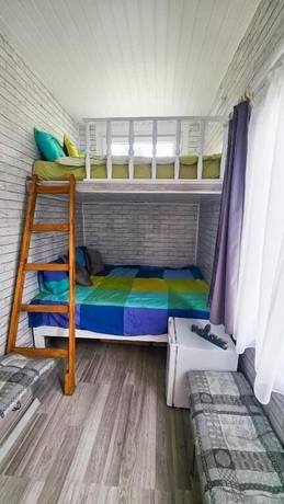 Imagen de la habitación del Hotel Pura Vida Downtown Tiny Houses. Foto 16
