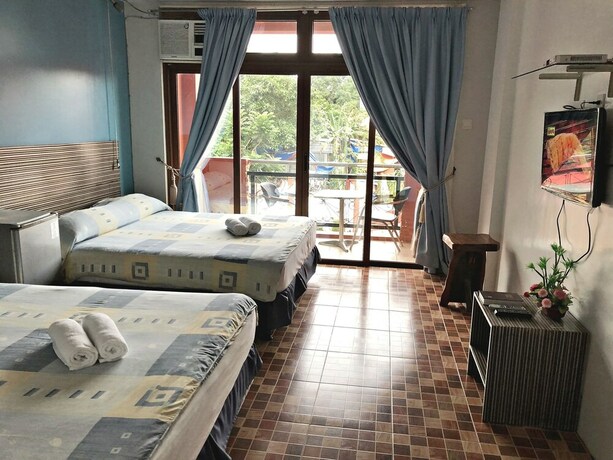 Imagen de la habitación del Hotel Pura Vida Resort. Foto 13