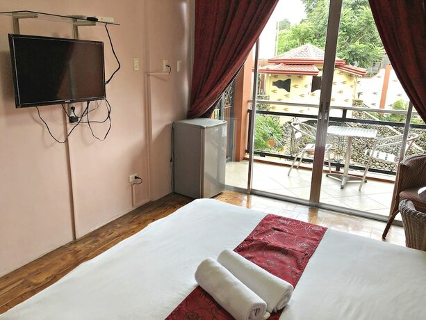 Imagen de la habitación del Hotel Pura Vida Resort. Foto 15