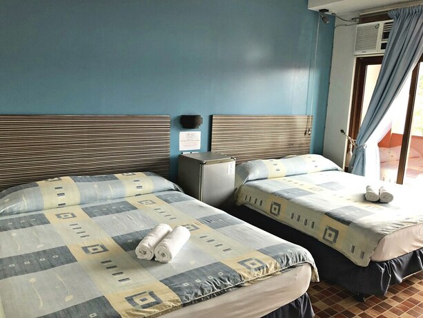 Imagen de la habitación del Hotel Pura Vida Resort. Foto 16