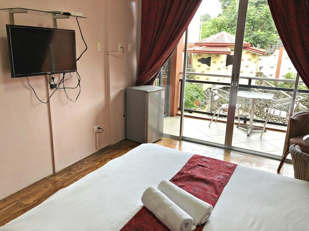 Imagen de la habitación del Hotel Pura Vida Resort. Foto 17