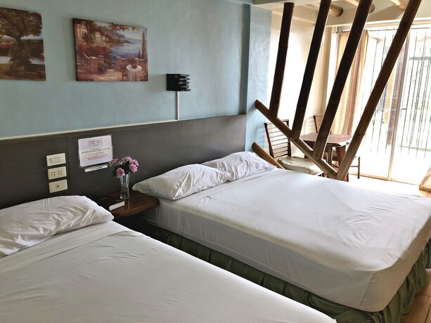Imagen de la habitación del Hotel Pura Vida Resort. Foto 37