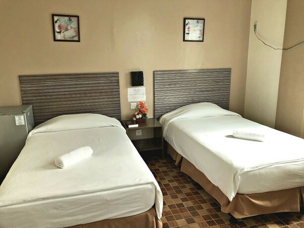 Imagen de la habitación del Hotel Pura Vida Resort. Foto 38