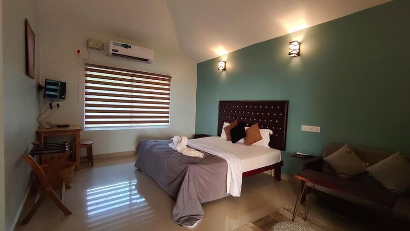 Imagen de la habitación del Hotel Pura Vida Varkala. Foto 3