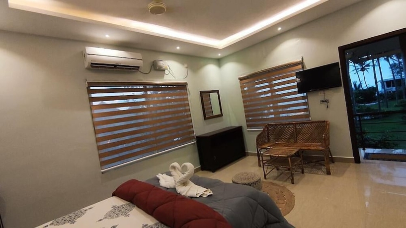 Imagen de la habitación del Hotel Pura Vida Varkala. Foto 7