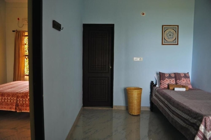 Imagen de la habitación del Hotel Pura Vida Varkala. Foto 16