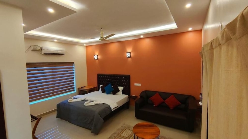 Imagen de la habitación del Hotel Pura Vida Varkala. Foto 17