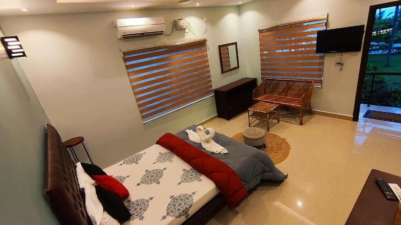 Imagen de la habitación del Hotel Pura Vida Varkala. Foto 19