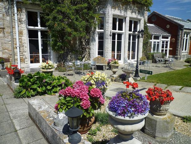 Imagen del bar/restaurante del Hotel Purbeck House Hotel & Louisa Lodge. Foto 3