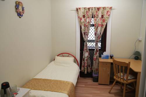 Imagen de la habitación del Hotel Pure Land Guest House. Foto 6