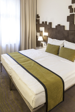 Imagen de la habitación del Hotel Pure White. Foto 5