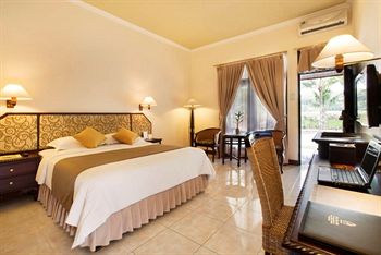 Imagen de la habitación del Hotel Puri Asri. Foto 8