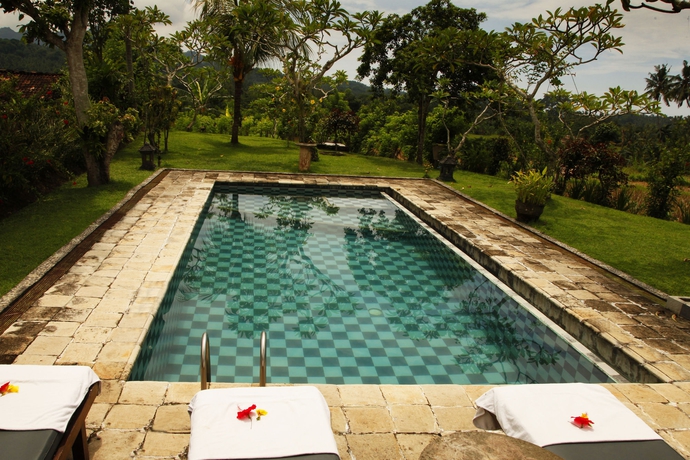 Imagen de la piscina del Hotel Puri Bagus Manggis. Foto 16