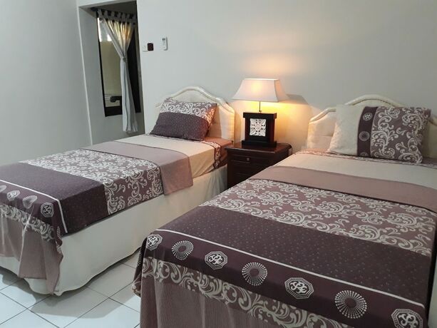 Imagen de la habitación del Hotel Puri Bali. Foto 13