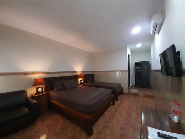Imagen de la habitación del Hotel Puri Bali. Foto 14