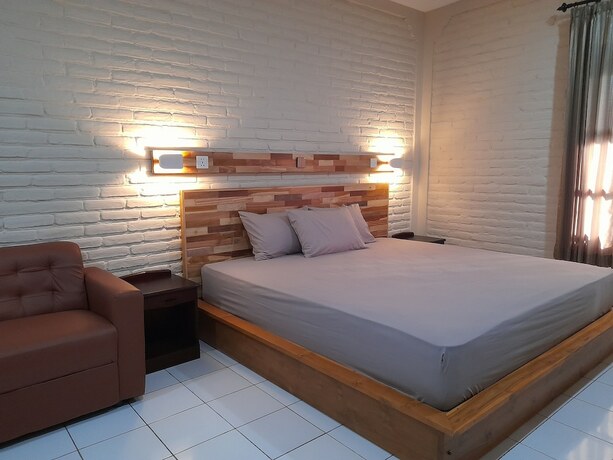 Imagen de la habitación del Hotel Puri Bali. Foto 16