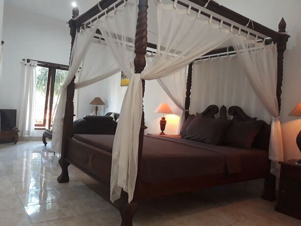 Imagen de la habitación del Hotel Puri Bali. Foto 20