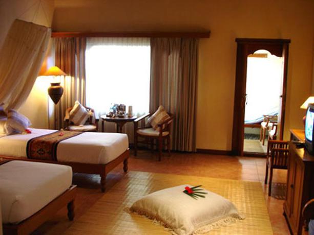 Imagen de la habitación del Hotel Puri Benoa Suites Bungalows. Foto 2