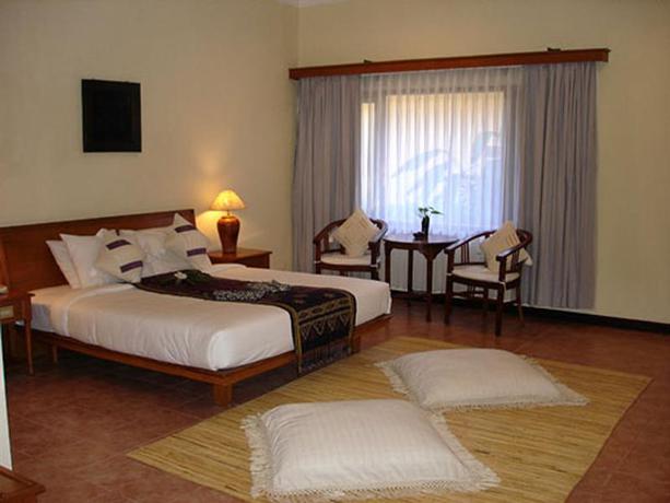 Imagen de la habitación del Hotel Puri Benoa Suites Bungalows. Foto 4