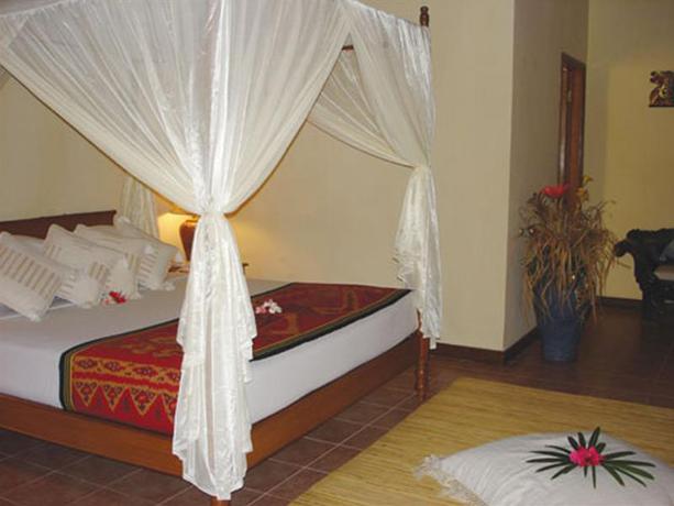 Imagen de la habitación del Hotel Puri Benoa Suites Bungalows. Foto 5