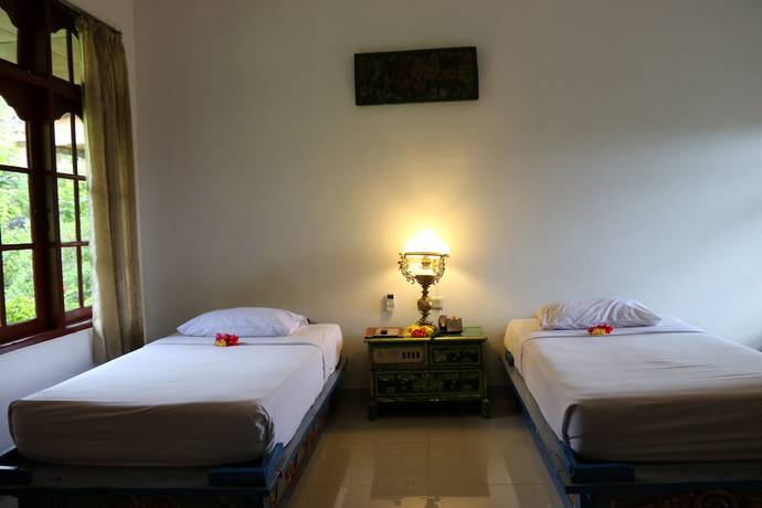 Imagen de la habitación del Hotel Puri Bunga Senggigi. Foto 4