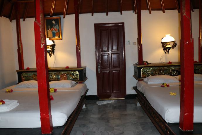 Imagen de la habitación del Hotel Puri Bunga Senggigi. Foto 7