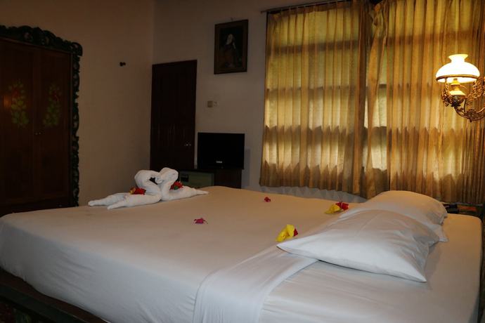 Imagen de la habitación del Hotel Puri Bunga Senggigi. Foto 8